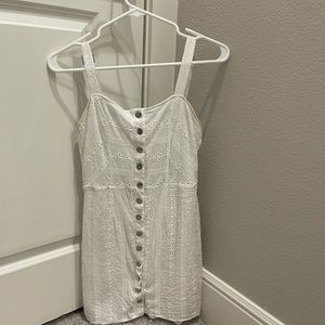 White dress with little flower decorations